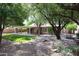 Beautiful backyard with mature trees providing plenty of shade for outdoor enjoyment at 11034 W Sierra Pinta Dr, Peoria, AZ 85373