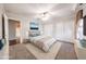 Bedroom with neutral tones, ceiling fan, an art piece, plush carpet, and a sliding door closet at 11034 W Sierra Pinta Dr, Peoria, AZ 85373