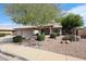 Inviting single-level home with a three-car garage and low maintenance desert landscape at 11034 W Sierra Pinta Dr, Peoria, AZ 85373