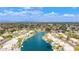 Waterfront neighborhood with beautiful homes lining the canal, offering scenic views and boating access for a vibrant lifestyle at 1146 W Sea Fog Dr, Gilbert, AZ 85233