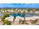 Enjoy this lovely property from above, set on a serene waterfront, surrounded by lush landscaping at 1146 W Sea Fog Dr, Gilbert, AZ 85233