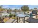 Cozy balcony with furniture and waterfront views, ideal for enjoying the scenic surroundings at 1146 W Sea Fog Dr, Gilbert, AZ 85233