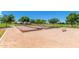 Multiple bocce ball courts with a bench, offering a dedicated space for leisurely games and recreation at 1146 W Sea Fog Dr, Gilbert, AZ 85233