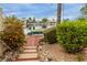 Scenic dock with a view of the tranquil lake, and waterfront homes at 1146 W Sea Fog Dr, Gilbert, AZ 85233