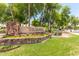 Community sign at 'The Islands' with landscaped flowerbeds and manicured lawns at 1146 W Sea Fog Dr, Gilbert, AZ 85233