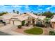 Beautiful single Gathering home highlighting manicured landscaping, and a tile roof at 1146 W Sea Fog Dr, Gilbert, AZ 85233