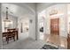 Bright foyer featuring a tile floor, grand archways, and high ceilings that create an open and airy ambiance at 1146 W Sea Fog Dr, Gilbert, AZ 85233