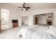 Spacious main bedroom featuring a seating area with fireplace at 1146 W Sea Fog Dr, Gilbert, AZ 85233