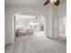Bright main bedroom leading to balcony through an arched doorway at 1146 W Sea Fog Dr, Gilbert, AZ 85233