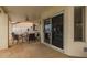 Covered patio with ample seating, perfect for outdoor entertaining and relaxation at 1146 W Sea Fog Dr, Gilbert, AZ 85233