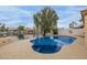 Beautiful blue pool with a view of the serene lake at 1146 W Sea Fog Dr, Gilbert, AZ 85233