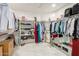 Large walk-in closet with ample storage space, shelving, and hanging racks at 1146 W Sea Fog Dr, Gilbert, AZ 85233
