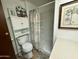 This is a full bathroom with a framed art print of a palm tree at 120 N Val Vista Dr # 151, Mesa, AZ 85213
