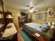 This bedroom features a ceiling fan and a window with blinds at 120 N Val Vista Dr # 151, Mesa, AZ 85213