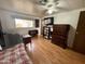 This bedroom has light walls and wood-look flooring at 120 N Val Vista Dr # 151, Mesa, AZ 85213