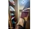 A small closet with shelves and clothes hangers, ready for storage at 120 N Val Vista Dr # 151, Mesa, AZ 85213