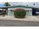 Charming mobile home featuring covered parking, well-kept landscaping, and quaint shutters at 120 N Val Vista Dr # 151, Mesa, AZ 85213