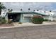 Inviting exterior view of home with lush landscaping and carport at 120 N Val Vista Dr # 151, Mesa, AZ 85213