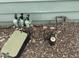 Exterior shot of the irrigation system with sprinklers on a gravel bed at 120 N Val Vista Dr # 151, Mesa, AZ 85213