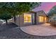 This home features a backyard patio, drought tolerant landscaping, and a security screen door at 1260 E Sweet Citrus Dr, Queen Creek, AZ 85140