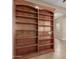 Built-in bookshelves provide ample storage space, with a view to the bathroom at 1260 E Sweet Citrus Dr, Queen Creek, AZ 85140