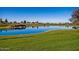 Beautiful view of the community's golf course, showcasing the water features and well-maintained greenery at 1260 E Sweet Citrus Dr, Queen Creek, AZ 85140