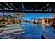 Resort-style pool featuring water fountains, sun loungers, and a swim-up bar for ultimate relaxation at 1260 E Sweet Citrus Dr, Queen Creek, AZ 85140