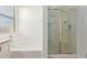 Well-lit bathroom showcasing a shower stall and separate soaking tub with window blinds at 1277 W Stephanie Ln, San Tan Valley, AZ 85143