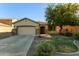 Charming single-story home with desert landscaping, and a two car garage at 1277 W Stephanie Ln, San Tan Valley, AZ 85143