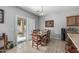 Bright dining area with natural light and sliding glass door access to the outdoors at 14318 N 142Nd Ln, Surprise, AZ 85379