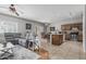 Living room area offers a great view of the open-concept kitchen and dining area at 14318 N 142Nd Ln, Surprise, AZ 85379