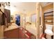 Relaxing bathroom boasts a soaking tub, separate shower, dual sinks, and direct access to a walk-in closet at 15245 W Crocus Dr, Surprise, AZ 85379