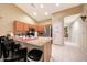 Kitchen boasts granite countertops, stainless steel appliances, and adjacent dining space at 15245 W Crocus Dr, Surprise, AZ 85379
