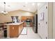 Well-lit kitchen featuring stainless steel appliances, ample counter space, and modern finishes at 15245 W Crocus Dr, Surprise, AZ 85379