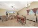 Inviting living room with comfortable seating and built-in shelving, perfect for relaxation and entertaining at 15245 W Crocus Dr, Surprise, AZ 85379