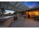 Outdoor kitchen with a grill and countertop space, perfect for entertaining and enjoying the backyard at 15245 W Crocus Dr, Surprise, AZ 85379