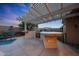 Outdoor kitchen area with a built-in BBQ and countertops - great for entertaining guests! at 15245 W Crocus Dr, Surprise, AZ 85379