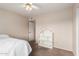 Bedroom featuring a dollhouse and carpet flooring at 15424 N 52Nd Pl, Scottsdale, AZ 85254