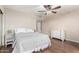 Comfortable bedroom showcasing a ceiling fan and laminate flooring at 15424 N 52Nd Pl, Scottsdale, AZ 85254