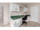 Cozy office nook features built in desk, drawers, and cabinets at 15424 N 52Nd Pl, Scottsdale, AZ 85254