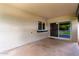Covered patio with a bar window, offering a seamless transition to outdoor entertaining at 15424 N 52Nd Pl, Scottsdale, AZ 85254