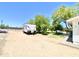 Spacious backyard with RV parking, mature shade trees, and ample room for outdoor activities at 15602 N 37Th St, Phoenix, AZ 85032