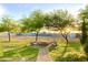 Inviting backyard with fire pit, perfect for enjoying tranquil evenings outdoors at 15602 N 37Th St, Phoenix, AZ 85032