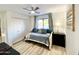 Comfortable guest bedroom with a ceiling fan and closet at 15602 N 37Th St, Phoenix, AZ 85032