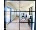 Home exercise room showcasing various equipment and ample natural light from surrounding windows at 15602 N 37Th St, Phoenix, AZ 85032