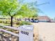 Inviting home exterior with lush greenery, a manicured lawn, brick-paved driveway and well-lit entrance at 15602 N 37Th St, Phoenix, AZ 85032