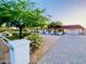 Charming single-story home featuring a red roof, white exterior, and well-manicured landscaping at 15602 N 37Th St, Phoenix, AZ 85032