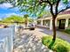 Paver patio with outdoor seating, fire pit, and lush landscaping creates an inviting space at 15602 N 37Th St, Phoenix, AZ 85032