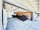 Spacious garage with an open garage door and multiple vehicles inside at 15602 N 37Th St, Phoenix, AZ 85032