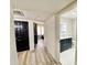 Hallway view with bathroom and bedroom access; neutral tones, and light-colored flooring at 15602 N 37Th St, Phoenix, AZ 85032